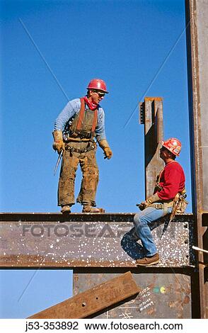 Ironworkers, connectors. Esquire Plaza building. Sacramento, California. USA View Large Photo Image Stock Image - Ironworkers, connectors. Esquire Plaza building. Sacramento, California. USA. Fotosearch