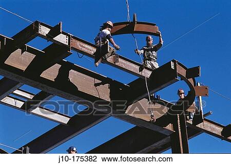 Ironworkers hang steel beams, construction. Boston. Massachusetts. USA View Large Photo Image Stock Image - Ironworkers hang steel beams, construction. Boston. Massachusetts. USA. Fotosearch