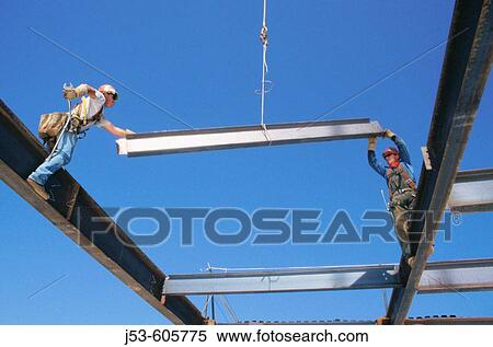 Ironworkers hanging structural steel View Large Photo Image Stock Photography - Ironworkers hanging structural steel. Fotosearch