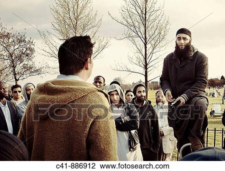 Stock Image - Islamic speaker at Speakers? Corner, Hyde Park, London. England, UK. Fotosearch