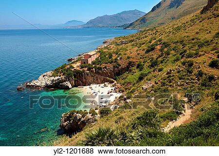 Isolated cove beach at Riserva Naturale dello Zingaro Zingaro nature reserve Scopello, Castellammare Del Golfo, Sicily View Large Photo Image Stock Photo - Isolated cove beach at Riserva Naturale dello Zingaro Zingaro nature reserve Scopello, Castellammare Del Golfo, Sicily. Fotosearch
