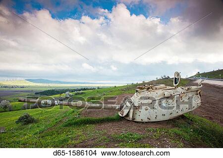 Israel, Golan Heights, MItzpe Quneitra, turret of Israeli tank points to Syrian town of Qunietra View Large Photo Image Picture - Israel, Golan Heights, MItzpe Quneitra, turret of Israeli tank points to Syrian town of Qunietra. Fotosearch