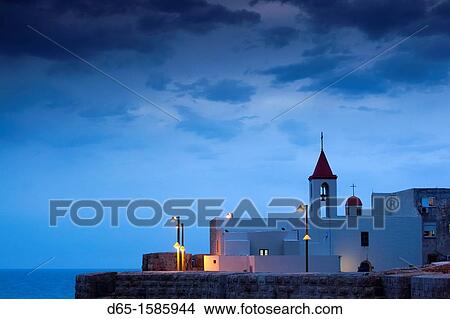 Picture - Israel, North Coast, Akko-Acre, ancient city, city walls, dusk. Fotosearch