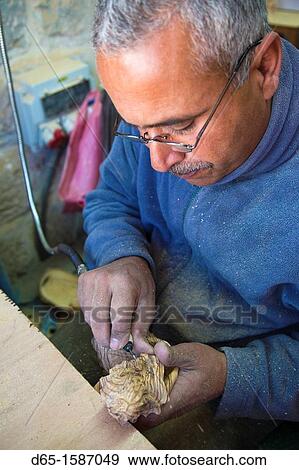 Israel, West Bank, Bethlehem, Arab Christian artisan making wooden religious figures, R, MR-ISL-11-003 View Large Photo Image Stock Photo - Israel, West Bank, Bethlehem, Arab Christian artisan making wooden religious figures, R, MR-ISL-11-003. Fotosearch