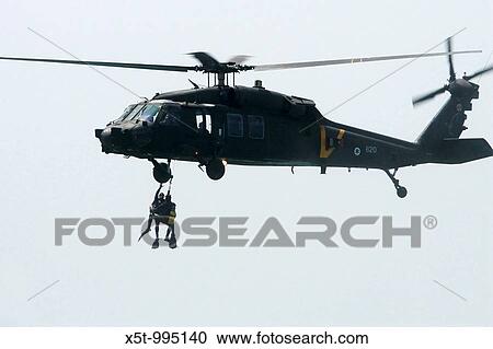 Israeli Air force helicopter, Sikorsky S-70 UH-60 Black Hawk during a sea rescue View Large Photo Image Stock Image - Israeli Air force helicopter, Sikorsky S-70 UH-60 Black Hawk during a sea rescue. Fotosearch