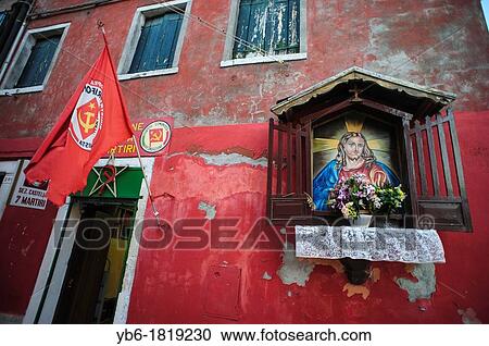 Italian Communist Party Office with Shrine to Sacred Heart of Jesus on Wall, Venice, Italy View Large Photo Image Stock Image - Italian Communist Party Office with Shrine to Sacred Heart of Jesus on Wall, Venice, Italy. Fotosearch