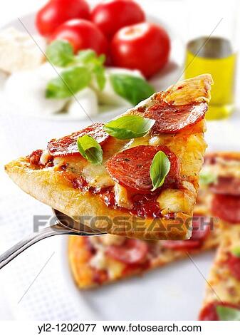 Italian pepperoni thin crust Pizza slice View Large Photo Image Stock Photo - Italian pepperoni thin crust Pizza slice. Fotosearch