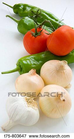 Italian peppers, tomatoes, onions and dried garlic View Large Photo Image Stock Photo - Italian peppers, tomatoes, onions and dried garlic. Fotosearch