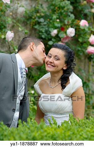 Italian wedding couple kissing in park, Firenze, Tuscany, Italy View Large Photo Image Stock Photo - Italian wedding couple kissing in park, Firenze, Tuscany, Italy. Fotosearch