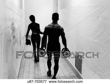 Italy, Lombardy, Bodybuilder with dumbbell View Large Photo Image Stock Photo - Italy, Lombardy, Bodybuilder with dumbbell. Fotosearch