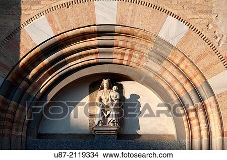 Italy, Lombardy, Crema, Detail Facade Cathedral, Statue of Virgin Mary with Baby Jesus. 14th century. View Large Photo Image Picture - Italy, Lombardy, Crema, Detail Facade Cathedral, Statue of Virgin Mary with Baby Jesus. 14th century.. Fotosearch