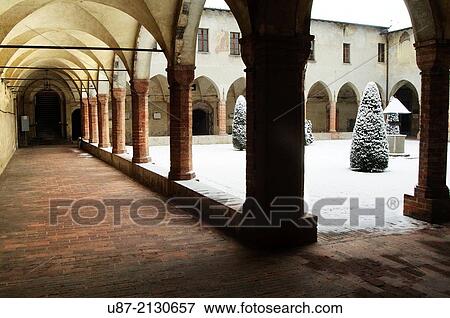 Stock Photo - Italy, Lombardy, Crema, St. Agostino Convent, Cloister whith Snow.. Fotosearch