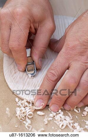 Italy, Lombardy, Cremona, Violin Maker Worshop, Man Carving a Violin View Large Photo Image Stock Photograph - Italy, Lombardy, Cremona, Violin Maker Worshop, Man Carving a Violin. Fotosearch