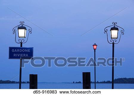 Italy, Lombardy, Lake District, Lake Garda, Gardone Riviera, ferry pier sign View Large Photo Image Stock Image - Italy, Lombardy, Lake District, Lake Garda, Gardone Riviera, ferry pier sign. Fotosearch