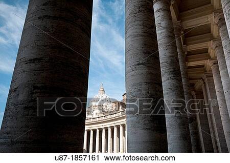 Stock Image - Italy, Rome, Vatican City, Saint Peter's Square, Bernini's Colonnade background Saint Peter Basilica. Fotosearch
