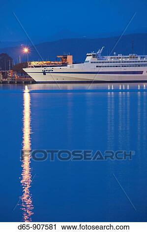 Italy, Sardinia, Eastern Sardinia, Ogliastra area, Arbatax, harbor and island ferry, dawn View Large Photo Image Stock Image - Italy, Sardinia, Eastern Sardinia, Ogliastra area, Arbatax, harbor and island ferry, dawn. Fotosearch