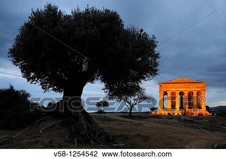 Stock Image - Italy, Sicily, Agrigento, World Heritage Site, Valley of Temples, Tempio della Concordia Temple of Concord at night. Fotosearch