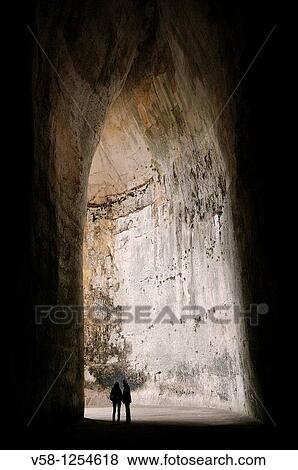 Stock Photo - Italy, Sicily, Syracuse, World Heritage Site, Neapolis, Parco archeologico, Latomva del Paradiso, Orecchio di Dionisio Ear of Dionysius. Fotosearch