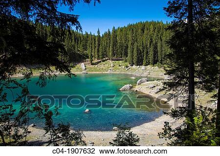 Italy, Trentino Alto Adige, Bolzano, Nova Levante, Carezza lake. View Large Photo Image Stock Image - Italy, Trentino Alto Adige, Bolzano, Nova Levante, Carezza lake.. Fotosearch