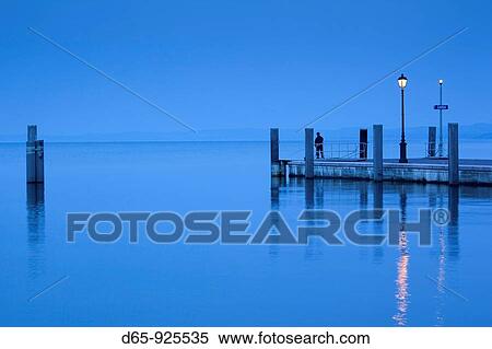 Italy, Veneto, Lake District, Lake Garda, Garda, lakeside pier view, dawn View Large Photo Image Stock Photography - Italy, Veneto, Lake District, Lake Garda, Garda, lakeside pier view, dawn. Fotosearch