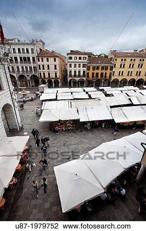 Stock Image - Italy, Veneto, Padua, Piazza delle Erbe Square, Stall Market.. Fotosearch