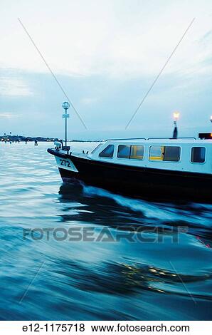 Italy, Venice, Laguna, Islands, the world of the vaporetto, night on the channel with vaporetto. View Large Photo Image Stock Photo - Italy, Venice, Laguna, Islands, the world of the vaporetto, night on the channel with vaporetto.. Fotosearch