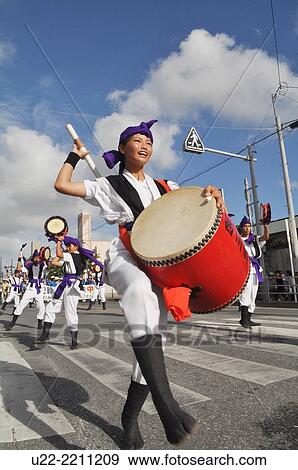 Itoman, Okinawa, Japan: Eisa performance at the Tsunahiki - Tug of War festival, in September View Large Photo Image Stock Photo - Itoman, Okinawa, Japan: Eisa performance at the Tsunahiki - Tug of War festival, in September. Fotosearch
