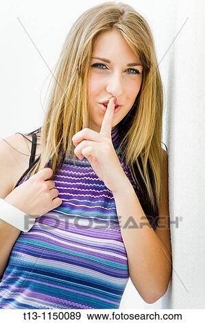 It's a secret - young woman portrait View Large Photo Image Stock Photo - It's a secret - young woman portrait. Fotosearch