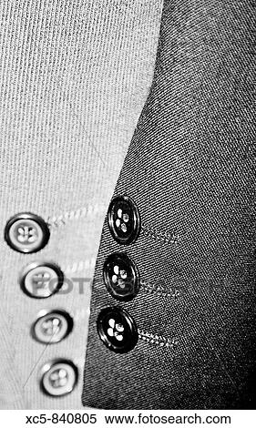 Jackets hanging in wardrobe, detail View Large Photo Image Stock Photography - Jackets hanging in wardrobe, detail. Fotosearch