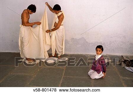 JAIN FAITHFUL GETTING DRESSED FOR THE PUJA OR WORSHIP, MOUNT SHETRUNJAYA, PALITANA, GUJARAT, INDIA View Large Photo Image Stock Photo - JAIN FAITHFUL GETTING DRESSED FOR THE PUJA OR WORSHIP, MOUNT SHETRUNJAYA, PALITANA, GUJARAT, INDIA. Fotosearch