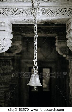 Stock Image - Jain Temple bell in Jaisalmer in Rajasthan in India.. Fotosearch