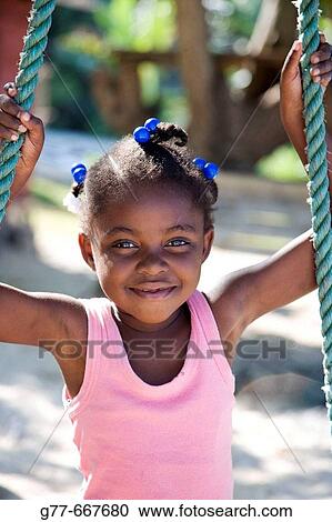 Jamaica. Negril. Little Jamaican girl. View Large Photo Image Stock Image - Jamaica. Negril. Little Jamaican girl.. Fotosearch