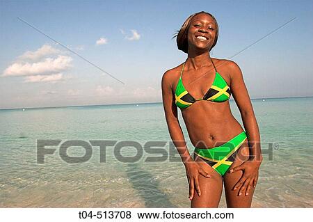 jamaican woman bikini jamaica negril flag beach t04 fotosearch