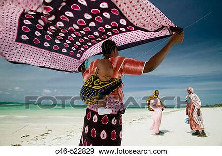 Jambiani beach, women. Zanzibar Island. Tanzania View Large Photo Image Stock Photo - Jambiani beach, women. Zanzibar Island. Tanzania. Fotosearch