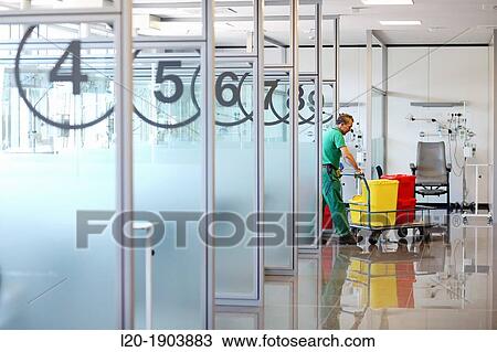 Stock Image - Janitor, Boxes chemotherapy, Onkologikoa Hospital, Oncology Institute, Case Center for prevention, diagnosis and treatment of cancer, Donostia, San Sebastian, Gipuzkoa, Basque Country, Spain. Fotosearch
