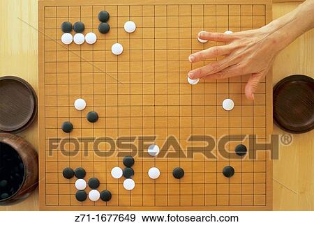 Japan, go, oriental strategic board game View Large Photo Image Stock Photo - Japan, go, oriental strategic board game. Fotosearch