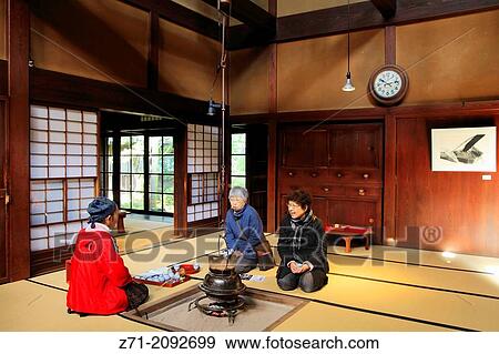 Japan, Hida, Takayama, Kusakabe Heritage House, interior, women drinking tea,. View Large Photo Image Stock Photo - Japan, Hida, Takayama, Kusakabe Heritage House, interior, women drinking tea,.. Fotosearch