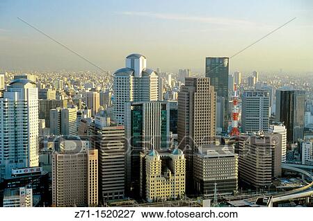 Japan, Kansai, Osaka, Kita business district general aerial panoramic view skyline View Large Photo Image Stock Photo - Japan, Kansai, Osaka, Kita business district general aerial panoramic view skyline. Fotosearch