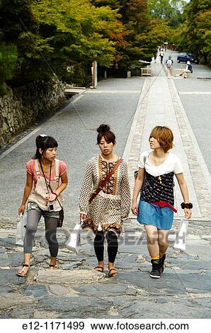Japan, Kyoto, Arashiyama area, temple Tenryu-ji girls visiting, taking pictures. View Large Photo Image Stock Photo - Japan, Kyoto, Arashiyama area, temple Tenryu-ji girls visiting, taking pictures.. Fotosearch