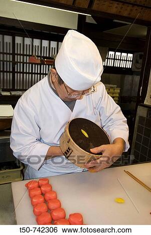 Japan, Kyoto, master's hands in preparing pastry shi, types of colourful Japanese sweets View Large Photo Image Stock Photograph - Japan, Kyoto, master's hands in preparing pastry shi, types of colourful Japanese sweets. Fotosearch