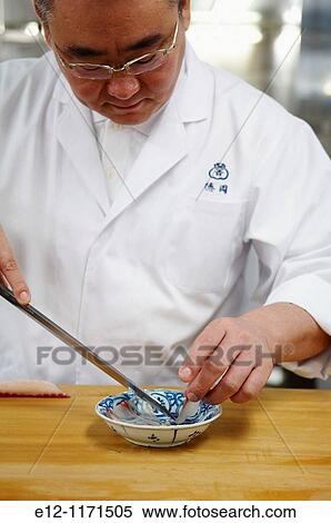 Japan, Kyoto, Ryotei Kitcho, Kunio Tokuoka slicing carpaccio bream. View Large Photo Image Stock Photography - Japan, Kyoto, Ryotei Kitcho, Kunio Tokuoka slicing carpaccio bream.. Fotosearch
