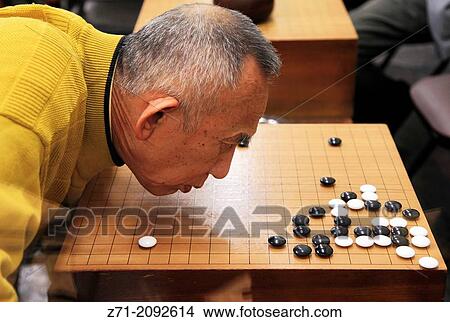 Japan, Osaka, go player,. View Large Photo Image Picture - Japan, Osaka, go player,.. Fotosearch