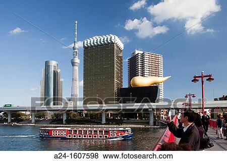 Stock Photo - Japan-Tokyo City-Sumida River-New Asakusa Skyline and Sky Tree Tower. Fotosearch