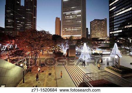 Japan, Tokyo, Shinjuku, skyscrapers, people, street scene at night. View Large Photo Image Picture - Japan, Tokyo, Shinjuku, skyscrapers, people, street scene at night.. Fotosearch
