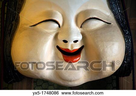 Stock Photograph - Japanese fat lady mask. Fotosearch