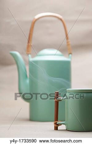 Stock Image - Japanese teapot with cup. Fotosearch