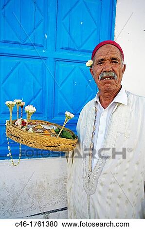 Jasmine seller, village of Sidi Bou Said near Tunis Tunisia. View Large Photo Image Stock Image - Jasmine seller, village of Sidi Bou Said near Tunis Tunisia.. Fotosearch