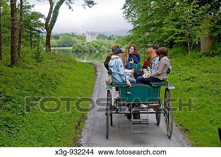 Jaunting is a popular way to see some of the National Park in the city of Killarney, Co. Cork, Ireland View Large Photo Image Picture - Jaunting is a popular way to see some of the National Park in the city of Killarney, Co. Cork, Ireland. Fotosearch