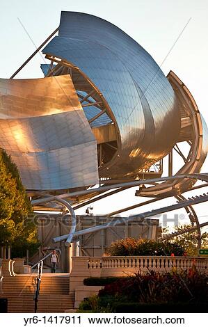 Stock Image - Jay Pritzker Pavilion designed by Frank Gehry in Millennium Park in Chicago, IL, USA. Fotosearch