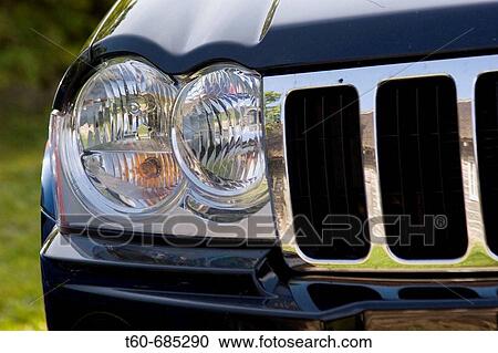 Stock Image - Jeep headlights. Fotosearch